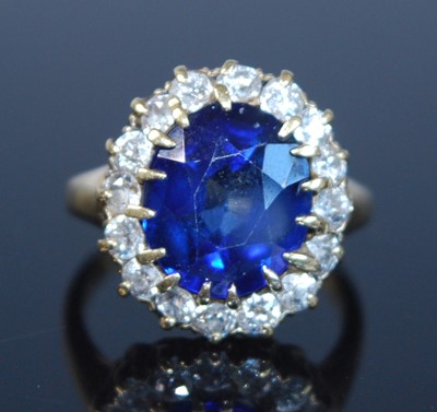 Lot 2346 - A yellow metal synthetic sapphire and diamond...