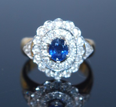 Lot 2378 - A yellow and white metal, sapphire and diamond...