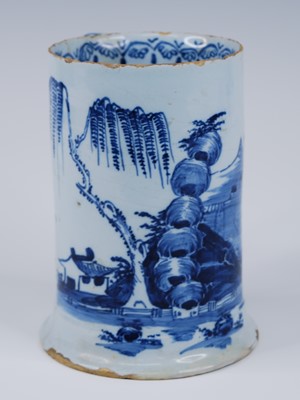 Lot 2079 - An English blue and white delftware tankard,...