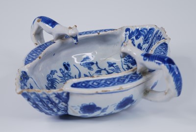 Lot 2083 - A Liverpool blue and white delftware double...