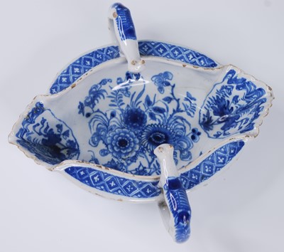 Lot 2083 - A Liverpool blue and white delftware double...