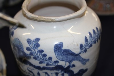Lot 2076 - An English blue and white delftware dry drug...
