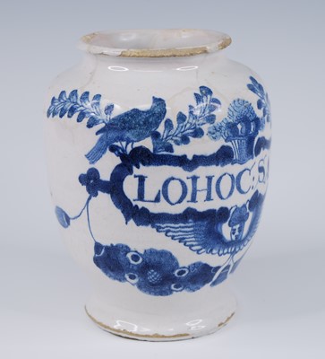 Lot 2076 - An English blue and white delftware dry drug...
