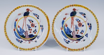 Lot 2072 - A pair of London polychrome delftware plates,...