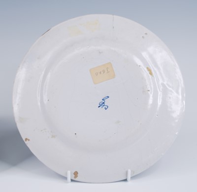 Lot 2068 - A blue and white delftware pill slab, in the...