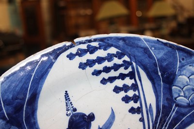 Lot 2146 - A Delft blue and white charger, 18th century,...