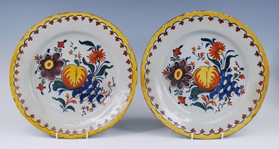 Lot 2176 - A pair of Dutch polychrome chargers, 18th...