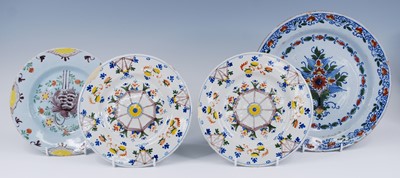 Lot 2066 - A pair of Lambeth polychrome delftware plates,...
