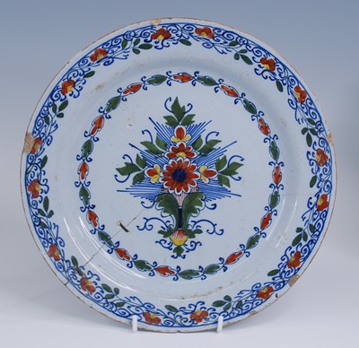 Lot 2066 - A pair of Lambeth polychrome delftware plates,...