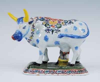 Lot 2165 - A Delft polychrome model of a cow, probably...
