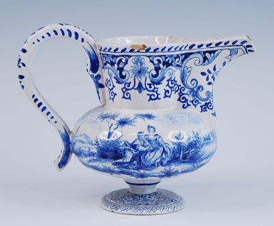 Lot 2151 - A Delft blue and white ewer, 18th century,...