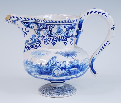 Lot 2151 - A Delft blue and white ewer, 18th century,...