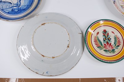 Lot 2132 - A French polychrome faience plate, 18th...