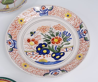 Lot 2132 - A French polychrome faience plate, 18th...