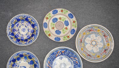 Lot 2137 - A collection of five Spanish polychrome glazed...