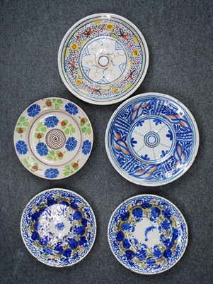 Lot 2137 - A collection of five Spanish polychrome glazed...