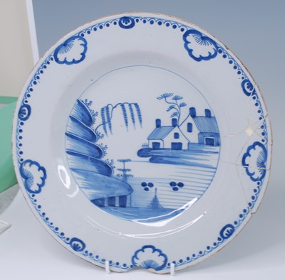 Lot 2091 - A Bristol blue and white delftware charger,...