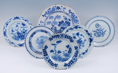 Lot 2105 - An English blue and white delftware charger,...