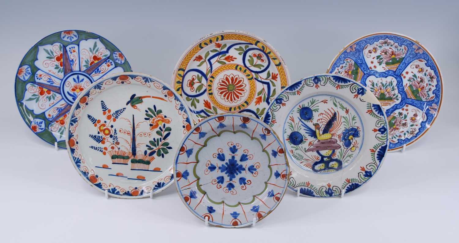Lot 2143 - A collection of six Delft polychrome plates,...