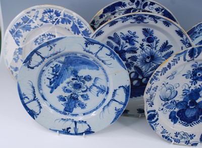 Lot 2101 - An English blue and white delftware charger,...