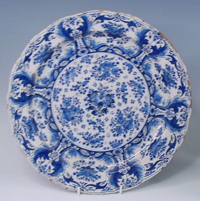 Lot 2144 - A Delft blue and white charger, 18th century,...