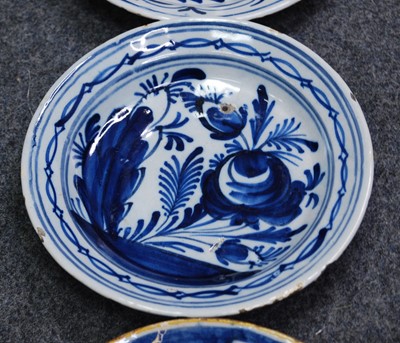 Lot 2107 - An English blue and white delftware dish,...
