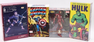 Lot 984 - A collection of plastic and resin superhero...