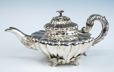 Lot 2276 - A George IV silver 'water-lily' teapot, of...