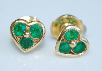 Lot 2327 - A pair of yellow metal heart shaped ear studs,...