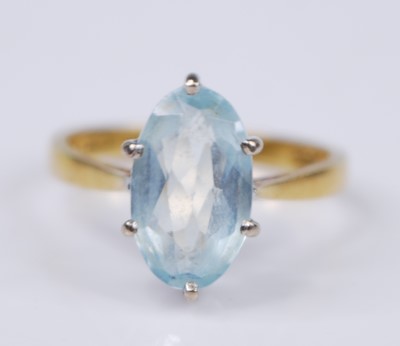 Lot 2364 - An 18ct yellow and white gold aquamarine...