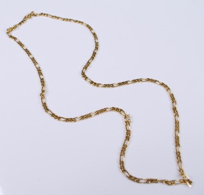 Lot 2348 - A yellow metal filed figaro link neck chain,...