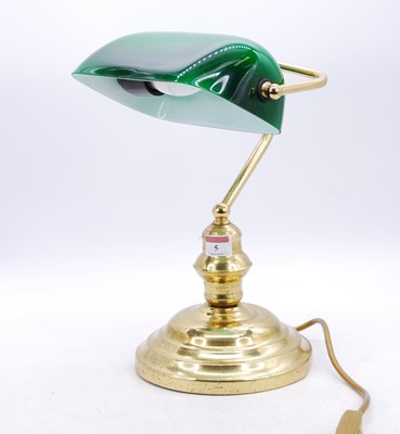 Lot 5 - A 20th century brass desk lamp, having green...