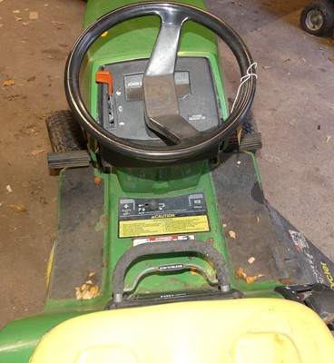 Lot 1191 - A John Deere STX30 petrol driven ride-on lawn...