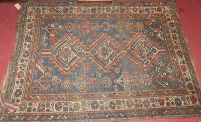 Lot 1192 - A small Persian woollen blue ground Shiraz rug,...