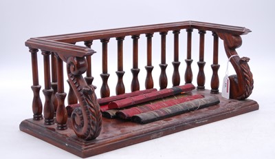 Lot 16 - A reproduction carved mahogany book shelf,...