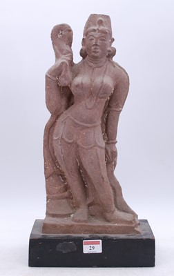 Lot 29 - An Eastern carved sandstone figure of a lady,...