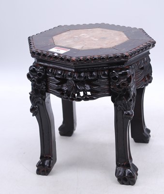 Lot 36 - A Chinese marble topped carved hardwood table,...