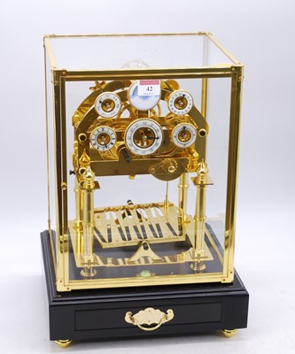 Lot 42 - A reproduction brass congreve clock, having...