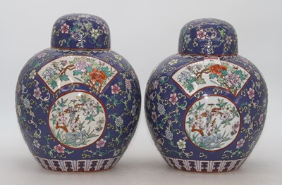 Lot 46 - A pair of Chinese ginger jars and covers, each...