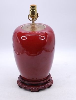 Lot 20 - A Chinese Sang du Boeuf table lamp, of ovoid...