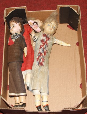 Lot 84 - Three various antique dolls, to include wax...