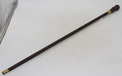 Lot 92 - A modern walking stick, having a resin...