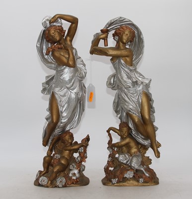 Lot 102 - A pair of gilt metal figures of ladies, h.42cm