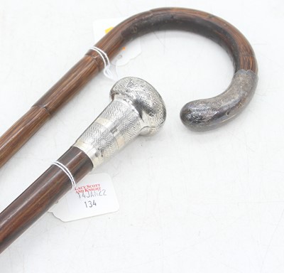 Lot 134 - An early 20th century rosewood walking stick,...