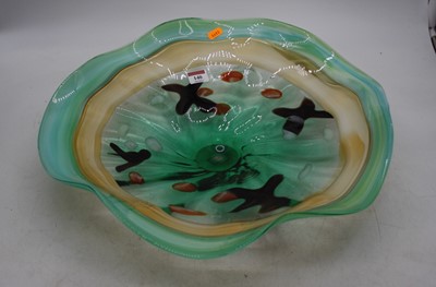 Lot 140 - A 20th century studio glass bowl, with red,...