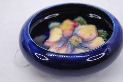 Lot 186 - A Moorcroft Clematis pattern dish, dia.11.5cm