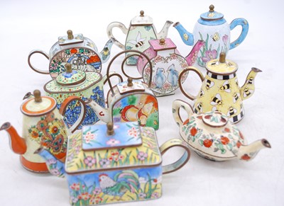 Lot 194 - A collection of Eastern enamel decorated...