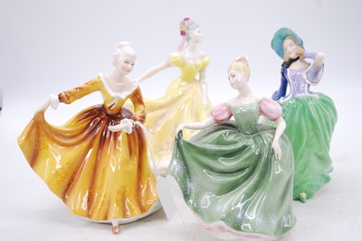 Lot 197 - A collection of four Royal Doulton porcelain...