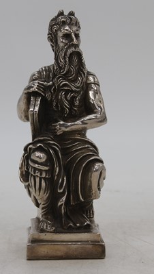 Lot 274 - A silver clad model of a bearded gentleman,...