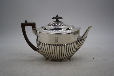 Lot 302 - A Victorian silver teapot, of half-reeded form,...